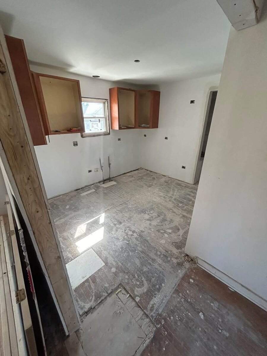 Kitchen area prepared for wall and flooring updates